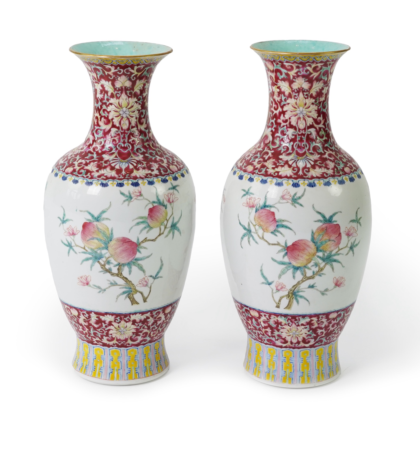 A pair of Chinese famille rose ‘sanduo’ vases, Qianlong seal mark, 19th century
